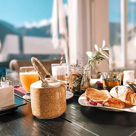 מלון Le White - Le 42 Restaurant Champéry